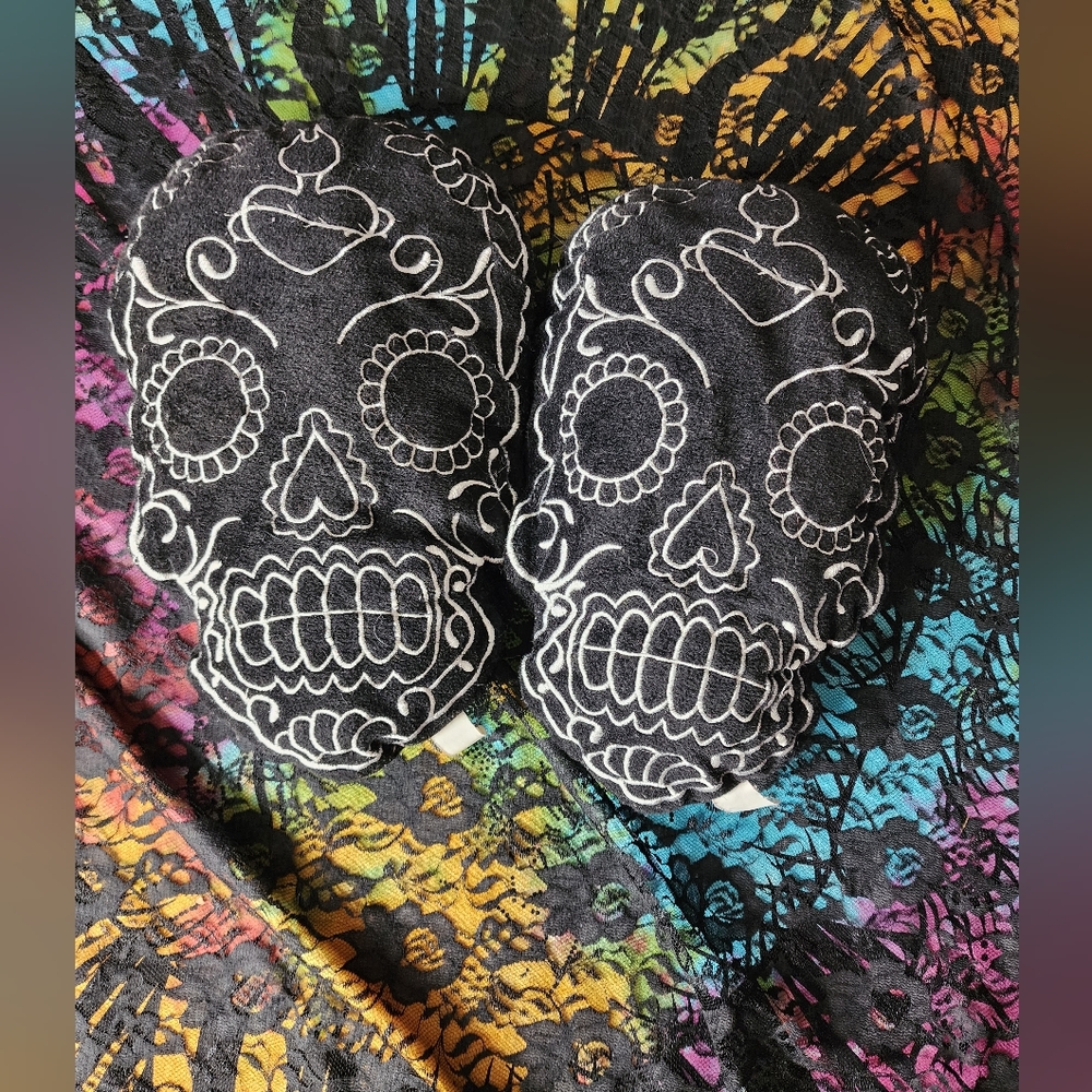 Sourpuss sugar skull pillow set.